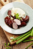 Pork cheeks in a red wine sauce with mashed potatoes