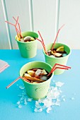 Sangria in cups with straws