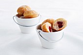 Mini doughnuts filled with strawberry jam