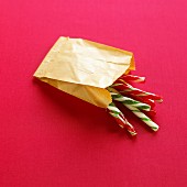 Candy canes in paper bag