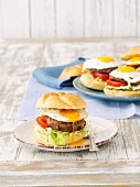 Kidney bean burgers with tomatoes and fried eggs