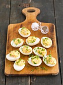 Eggs filled with ham, horseradish and cress