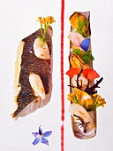A fish fillet with mussels and edible flowers