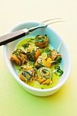 Grilled courgette and carrot rolls with an orange mint marinade