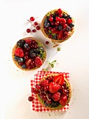 Three summery berry tarts