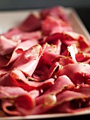 A platter of sliced ham