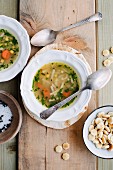 Vegetable soup in soup bowls (seen from above)