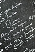 A specials board in a restaurant (France)