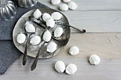Meringues with hazelnuts and icing sugar
