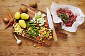 Ingredients for lamb stew with potatoes and beans