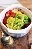 Savoy cabbage parcels with tomato sauce