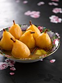 Poached pears in a spicy sauce