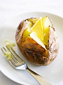 A jacket potato with butter