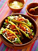 Tacos with minced meat and tomatoes