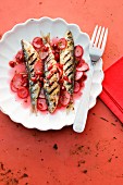 Sweet and sour pickled radishes with grilled sardines