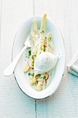 Asparagus with poached egg and a radish and chive vinaigrette