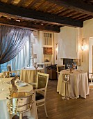 Tables laid in Restaurant Da Caino (Head Chef Valeria Piccini), Tuscany, Maremma