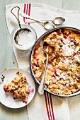 Rhubarb crumble dusted with icing sugar