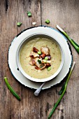 Leek and potato soup with chorizo and spring onions