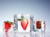 Ice cubes filled with strawberries and chocolate