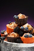 Carrot muffins with blackberries and blueberries for Halloween