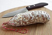 French salami on a wooden boards