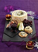 Stilton cheese with crackers, fruit and Port wine