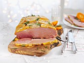 Glazed roast ham with oranges and rosemary