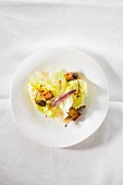 Caesar salad with polenta croutons, capers, anchovies and coriander