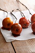 Toffee apples on a piece of baking paper