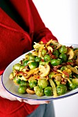 A Brussels sprouts medley with mushrooms, bacon and chilli