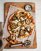 Pizza topped with grilled aubergines and goat's cheese