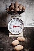 Potatoes on a pair of old kitchen scales