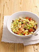 Couscous salad with cherry tomatoes, cucumber and mozzarella