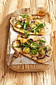 Tarte flambée with goat's cheese and red onions