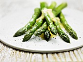 Green asparagus with butter sauce