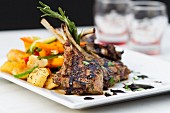 Grilled lamb chops with a side of vegetables