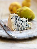 A slice of blue cheese and quinces