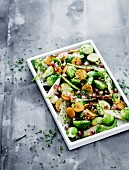 Brussels sprout salad with pomegranate seeds and walnuts