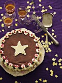 A festive Christmas cake decorated with marzipan stars