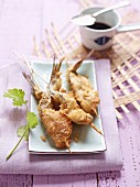 Herring in tempura batter on skewers