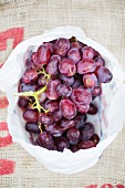 Red grapes in a plastic bag