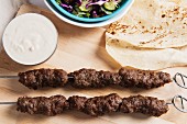 Kofte with unleavened bread and a dip
