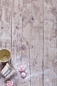 Baking tins and meringues on a rustic wooden table