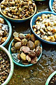 Various mussels and snails at a market in Saigon (Vietnam)