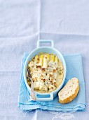 White asparagus bake with Roquefort sauce and walnuts