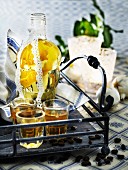 Lemon schnapps in bottles and glasses (Christmas)