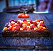Chocolate tart with raspberry, pepper and chilli confit
