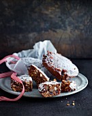 Panforte cakes with a ribbon on a grey plate