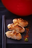Nigiri sushi with fried scallops